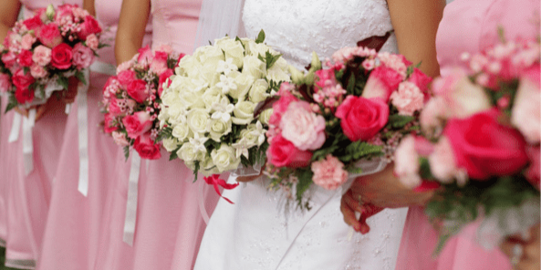 girls holding flowers